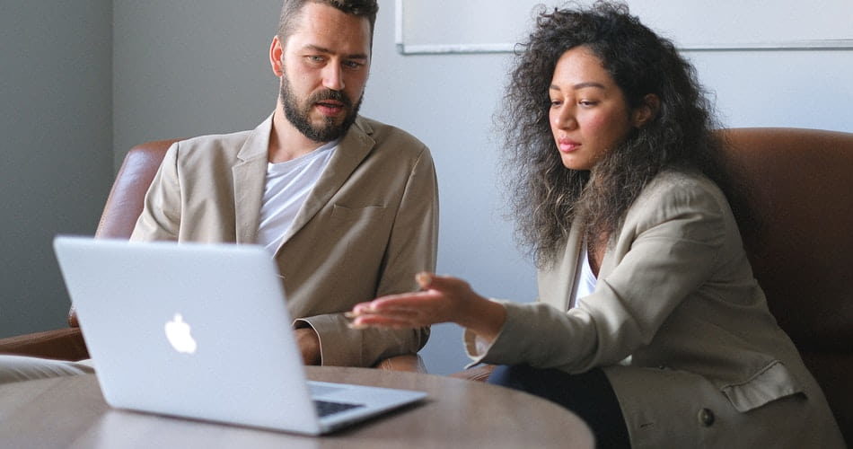 Manager helping Employee